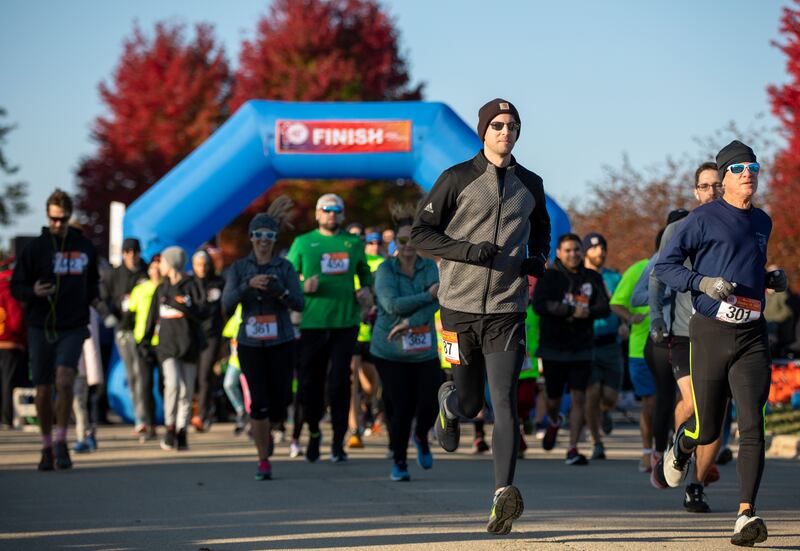 Participants begin the Marklund 10th annual Run, Walk & Roll-5k/1-mile event at the Marklund Hyde Center in Geneva on Sunday, Oct. 16, 2022.