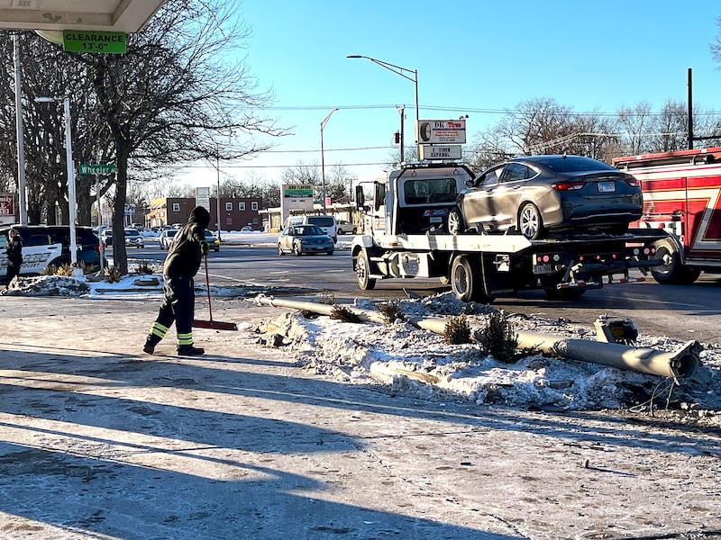 The aftermath of a three-vehicle crash on Thursday, Jan. 29, 2026, on West Jefferson Street, in Joliet, that led to a city light pole to get knocked down onto a roadway.