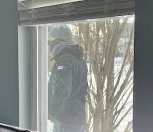 Oswego police: Husband of woman found dead in home saw man on surveillance camera 