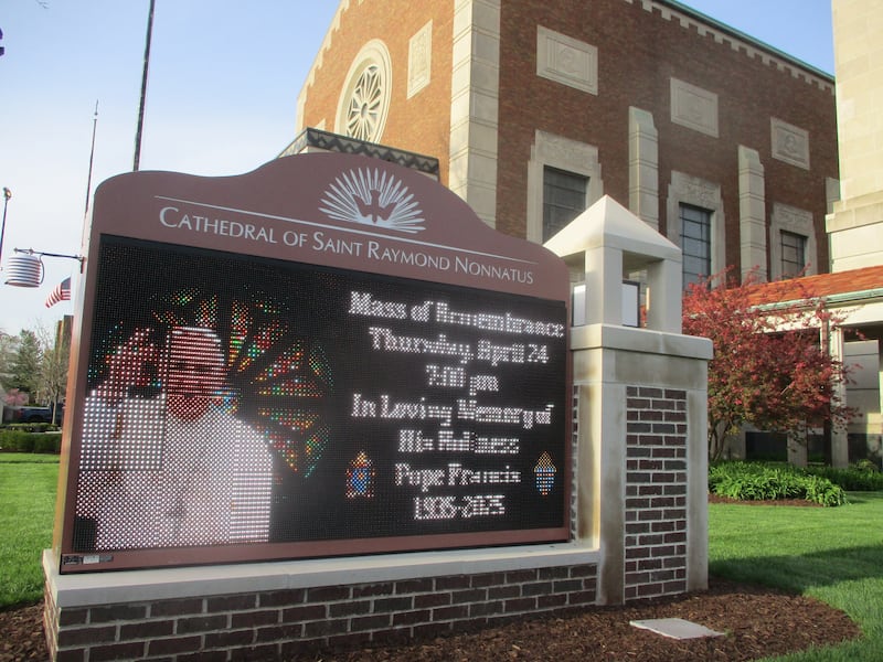 An electronic sign outside the Cathedral of St. Raymond Nonnatus in Joliet gave notice of the mass of remembrance for Pope Francis on Thursday. April 24, 2025