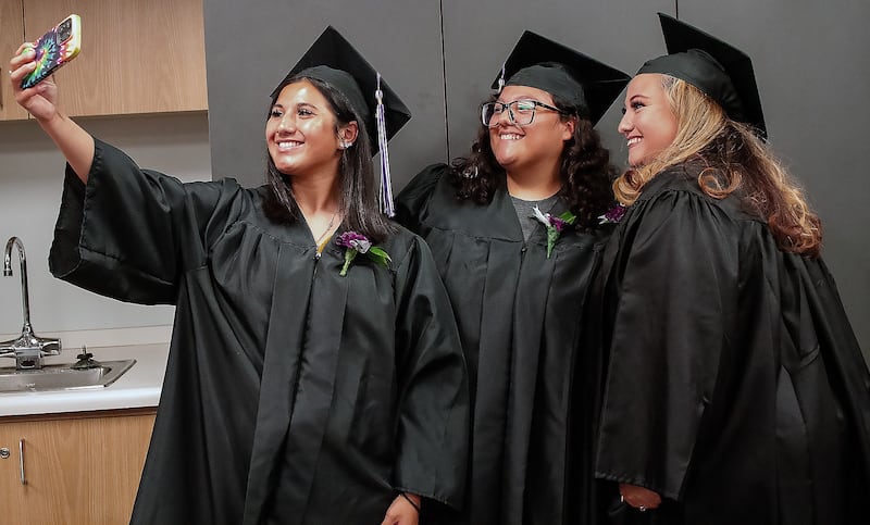 These 2024 graduates make memories as they prepare for IVCC's annual Adult Education Recognition event. This year's 44th annual recognition on Wednesday, May 21, honors students who have completed GEDs, citizenship studies or career pathway programs. Three of the completers will be keynote speakers for the event.