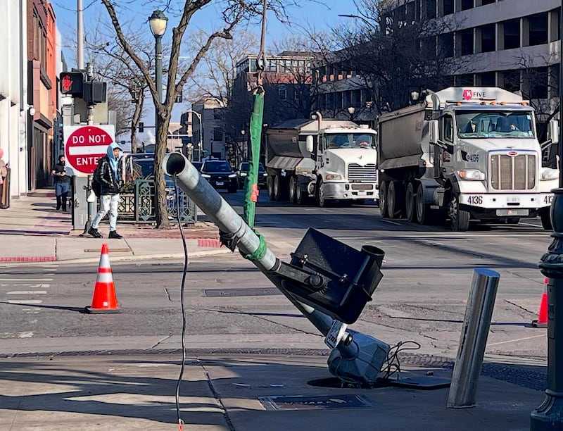 A damaged traffic signal seen on Feb. 13, 2026, near the Will County Courthouse in downtown Joliet.