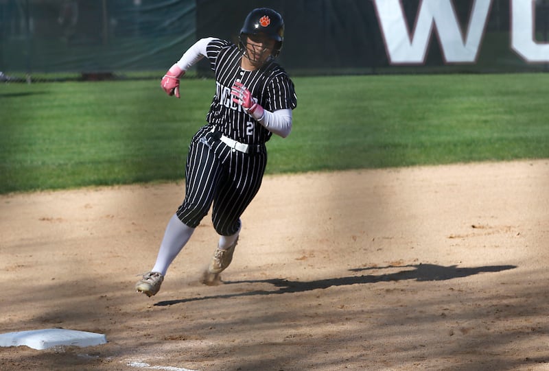 Crystal Lake Central's Ella Arana rounds third base on her way to scoring a run during a Fox Valley Conference softball game against Prairie Ridge on Monday, April 20, 2026, at Prairie Ridge High School.