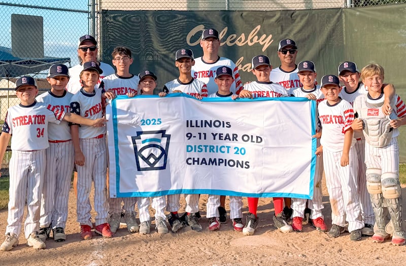 The Streator 11-Year-Old All-Stars proudly display their newly won District 20 championship banner captured Wednesday, July 9, 2025, in Oglesby.