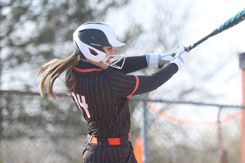 Minooka’s Chloe Miner connects for a grand slam against Joliet Catholic on Tuesday, April 7, 2026 in Minooka.