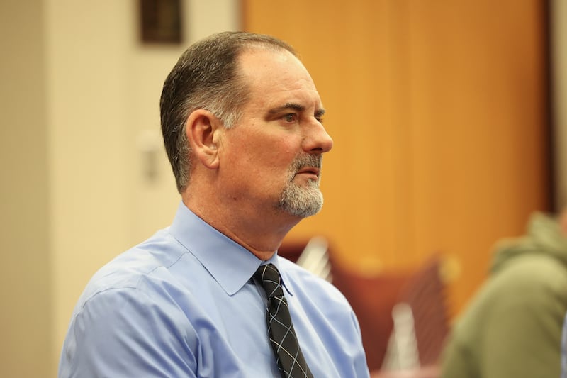 Plainfield District 202 Superintendent Dr. Glenn Wood listens to the board candidates at a moderated forum at the District 202 office on Thursday, March 16th, 2023 in Plainfield.