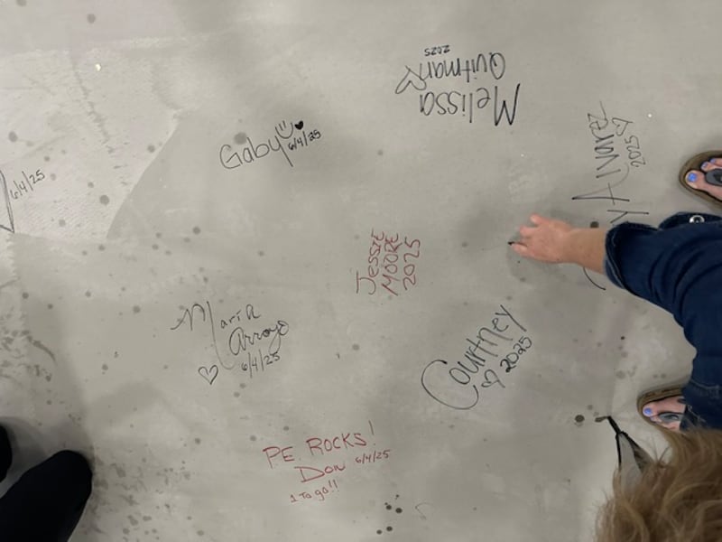 Gompers teachers and staff signed their names to the concrete floor of the school's new gymnasium, which is set to open in August 2025. 
Wednesday, June 4, 2025.