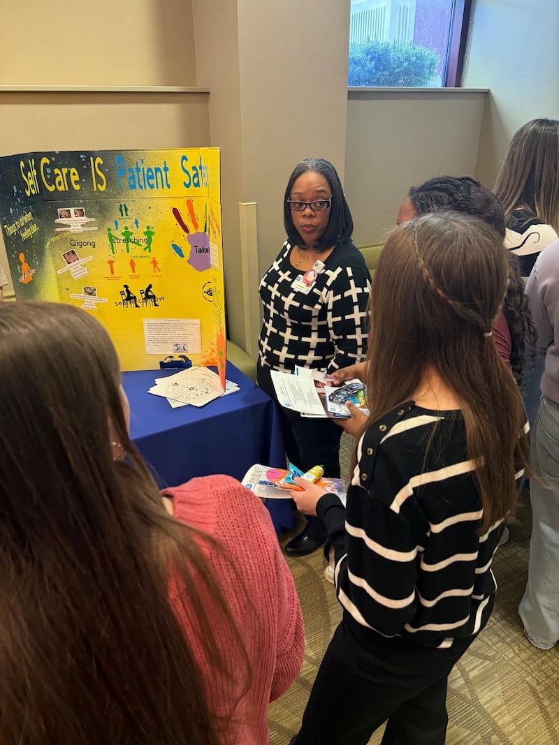 Students spent the morning touring City of Hope’s Zion campus, sharing lunch and rotating through 11 interactive stations staffed by hospital professionals from a wide range of departments. Each station offered students a firsthand look at different career paths within a hospital setting,