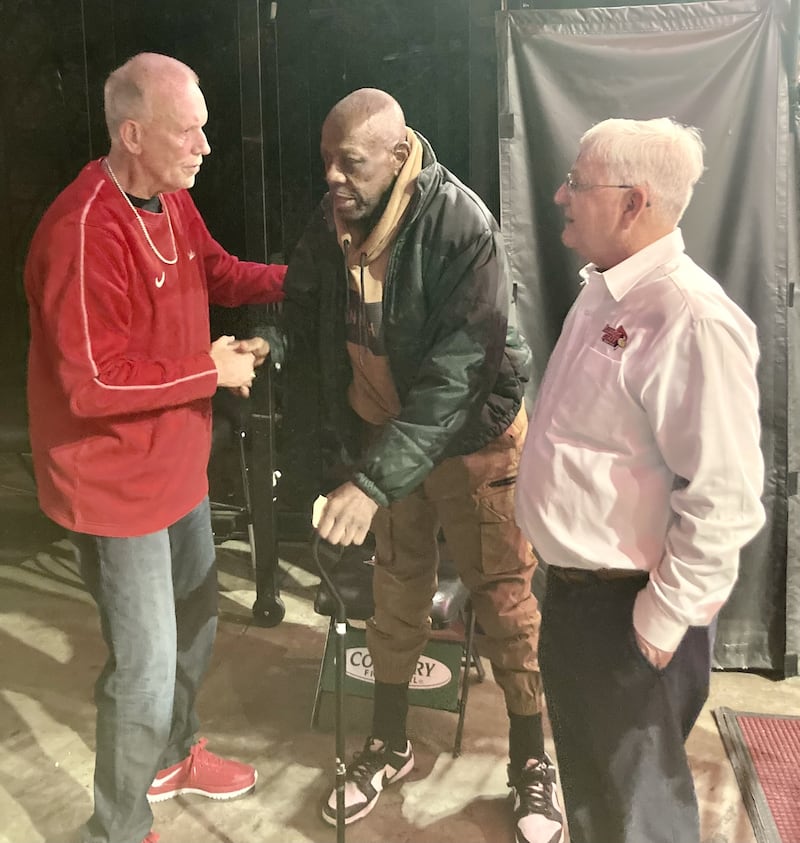 Former ISU Redbird teammates and legends Doug Colins (left) and Roger Powell Sr. meet on Feb. 1, 2025 at CEFCU Arena in Normal. Powell, who passed away on Saturday, March 21 at age 71, was longtime friends of Steve Danielson (right) who was the ISU team manager when Collins and Powell played. Their friendship knew no color and lasted for 55 years.