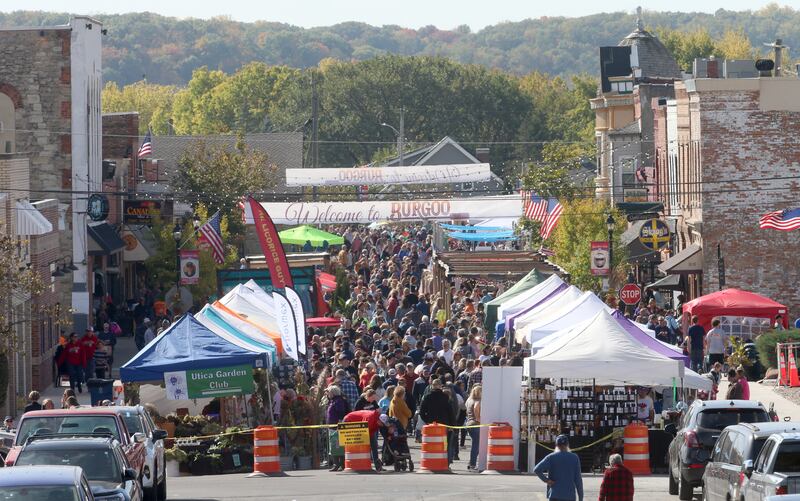 A large crowd walks down Mill Street for the 54th annual Burgoo on Sunday, Oct. 13, 2024 downtown Utica.