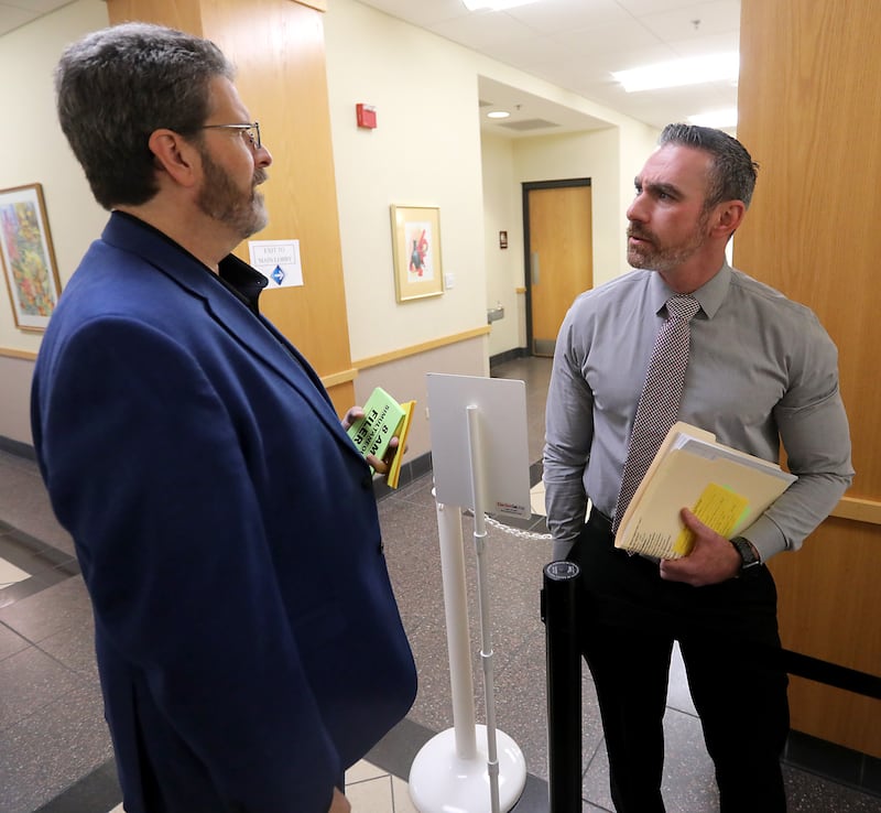McHenry County Clerk Joe Tirio (left) talks with McHenry County Sheriff Robb Tadelman as Tadelman waits in line on Monday, Oct. 27, 2025, at the McHenry County Clerk's Office in Woodstock to file his paperwork to run for reelection in next spring's primary. Tirio is also running for reelection as clerk. Both are Republicans.