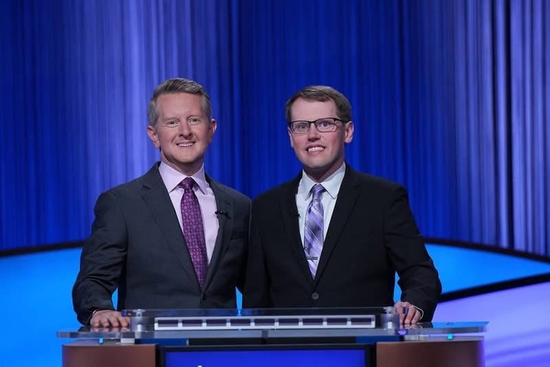 Steven Olson, band teacher at Princeton High School and Logan Junior High, met Jeopardy host Ken Jennings (left) when he taped a show in August in Los Angeles. The show will air on Friday, Sept. 19.