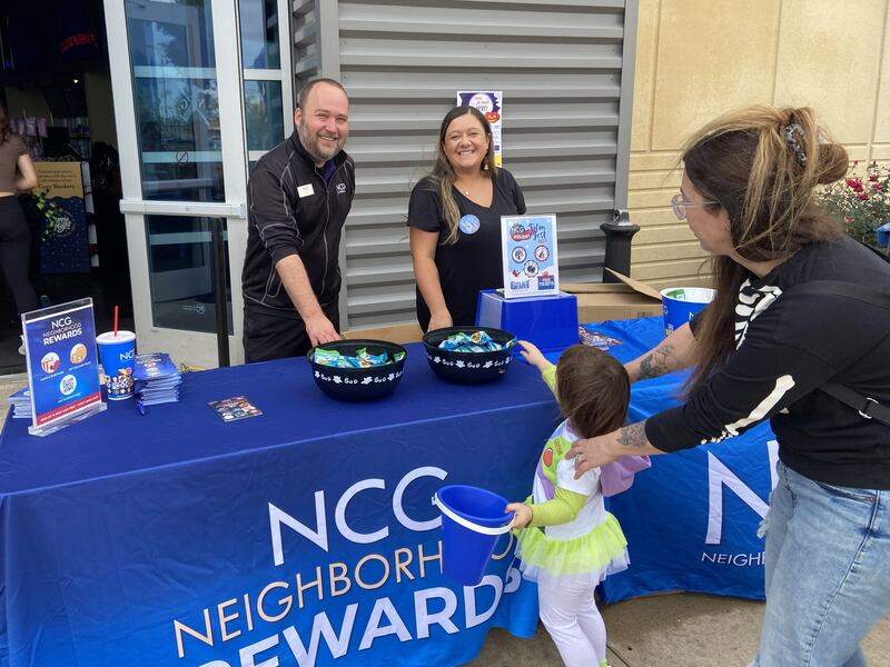 To candy and beyond. A costumed buzz lightyear reaches for some sweets during BizBoo!, an annual Halloween event hosted by the Yorkville Area Chamber of Commerce. The Oct. 18, 2025 event featured around 100 participating businesses.