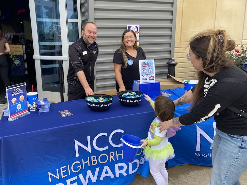 To candy and beyond. A costumed buzz lightyear reaches for some sweets during BizBoo!, an annual Halloween event hosted by the Yorkville Area Chamber of Commerce. The Oct. 18, 2025 event featured around 100 participating businesses.
