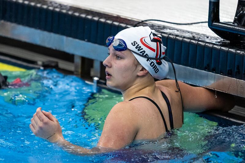 Bradley-Bourbonnais’s Aly Swafford checks the board after competing in the 50 Yard Freestyle during the IHSA Girls State Swimming Preliminaries at FMC Natatorium in Westmont on Nov. 14, 2025.