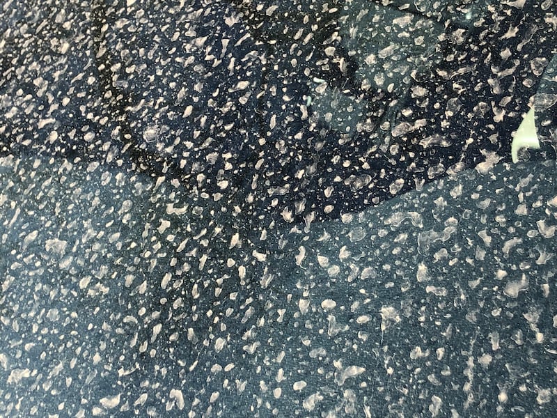 Dirty rain pictured on a windshield Feb. 18, 2026.