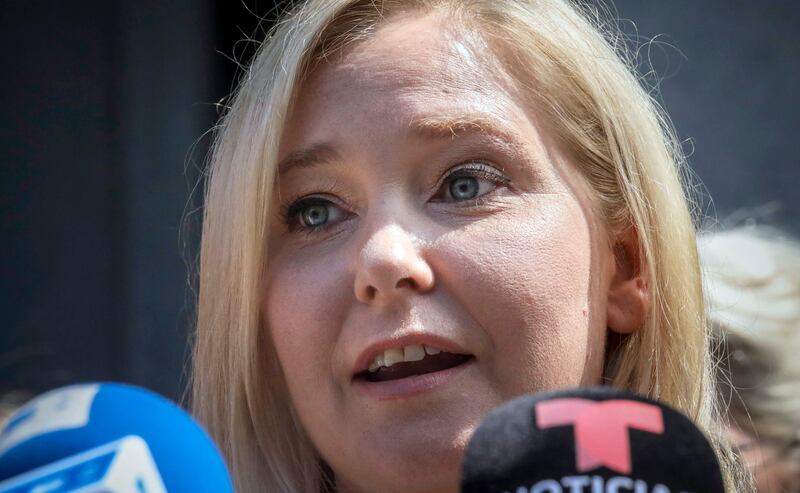 FILE - Virginia Giuffre speaks during a news conference outside a Manhattan court in New York, Aug. 27, 2019. (AP Photo/Bebeto Matthews, File)