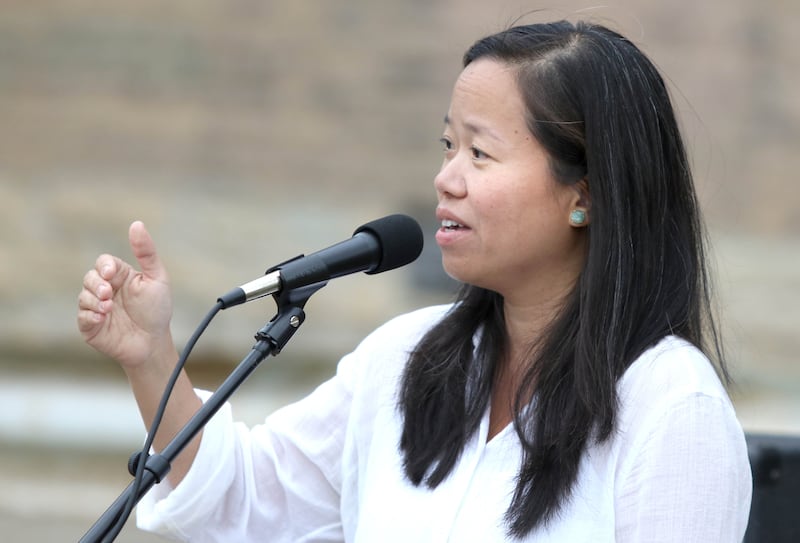 Shaw Local July 2021 file photo – DeKalb resident Linh Nguyen, a past president of The League of Women Voters of DeKalb County, speaks during a Deadline for Democracy rally Thursday at Memorial Park in DeKalb. Nguyen is running for DeKalb mayor in 2025.