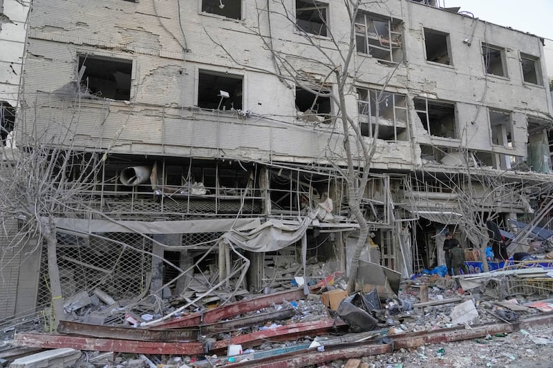 A building stands in ruins after a strike on a police station during ongoing, joint U.S.-Israeli military attacks in Tehran, Iran, Monday, March 2, 2026. (AP Photo/Vahid Salemi)