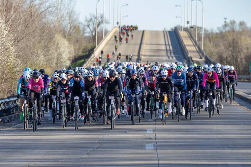 Cyclists ride town Illinois Route 47 during the Rough Road 100 during the 2024 race.