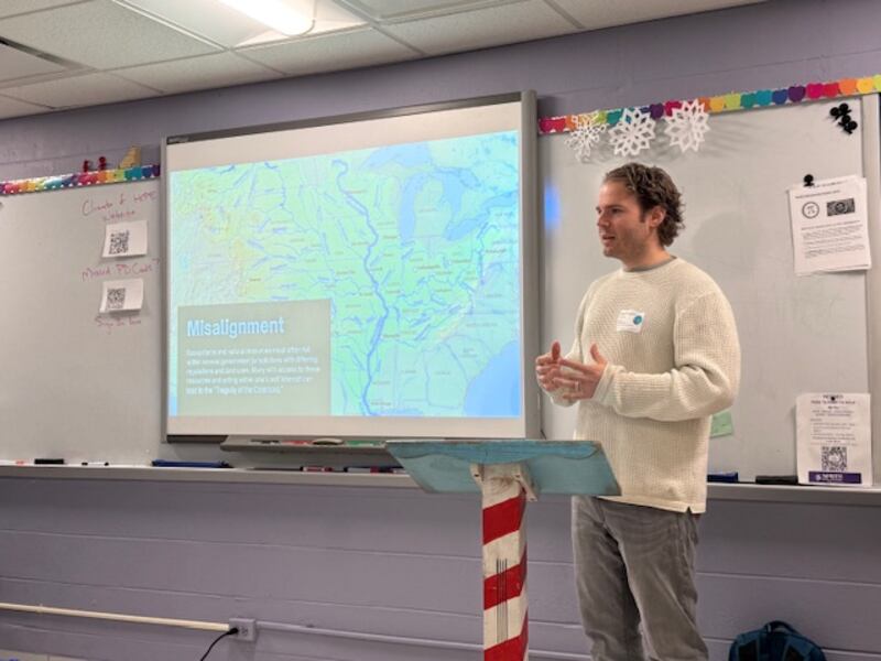 Erich Osterberg, professor of earth science at Dartmouth University, kicked off the 2026 Climate of HOPE Conference on Friday at Downers Grove North High School