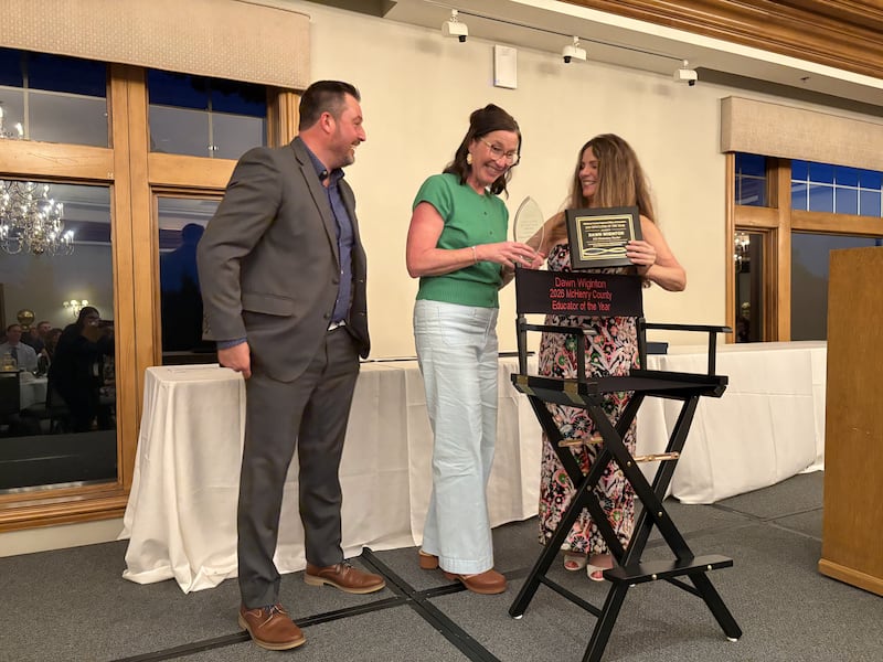 McHenry County Educator of the Year winner Dawn Wiginton is presented with a director's chair at the McHenry County Educator of the Year ceremony in Lake in the Hills, Saturday, May 9, 2026.