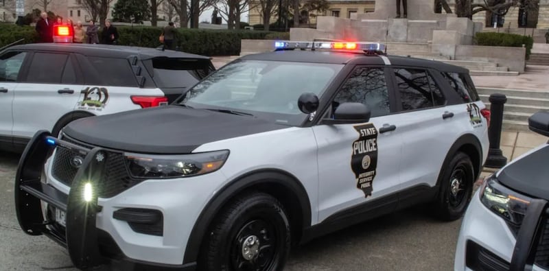 An Illinois State Police car is pictured outside the Illinois Capitol in Springfield during an event in 2022.