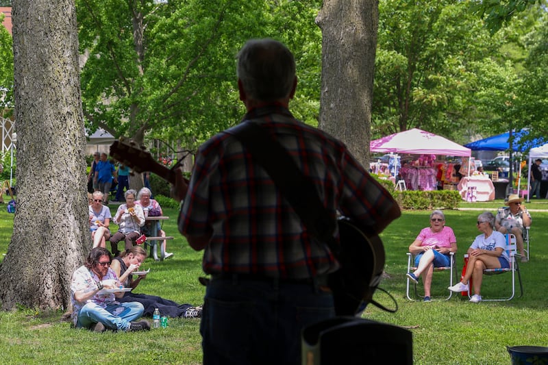 Attendees enjoy live music by Tim “The Tuneman” Rehmer during the 36th annual Rhubarb Festival at the Kankakee County Museum on Sunday, May 17, 2026.