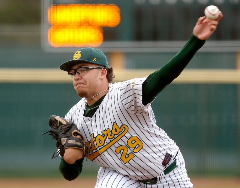 Crystal Lake South's Devin De Loach shows a pitch during a Fox Valley Conference baseball game against Hampshire on Monday, April 29, 2026, at Crystal Lake South High School.