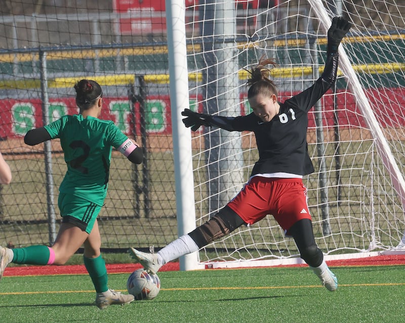 Streator keeper Leigha Gammie extends in an attempt to stop a shot from L-P's Vicky Tajada on Friday, March 27, 2026, at the L-P athletic complex in La Salle.