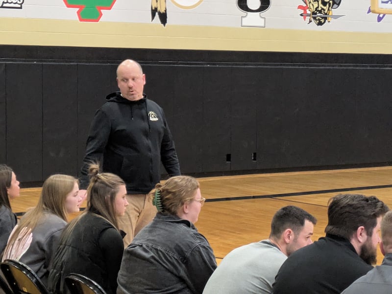 Sycamore coach Adam Wickness talks to the bench during Sycamore's win against Ottawa on Friday, Feb. 2, 2026.