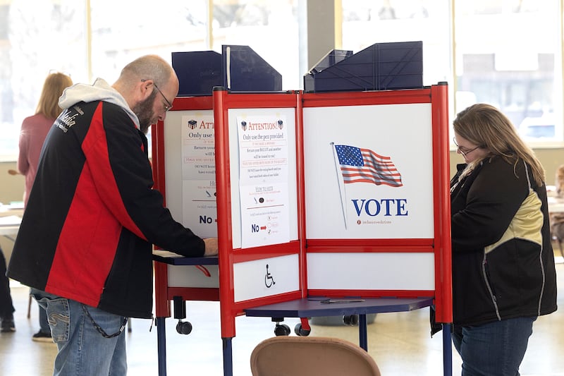 Nathan and Janel Stahr place their votes Tuesday, March 19, 2024, in Rock Falls. As is typical for primaries, voting was slow, according to election judges.