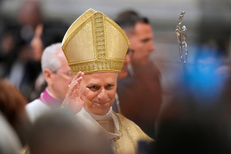 Pope Leo XIV waves after presiding over the ordination of four Auxiliary Bishops of Rome, in Rome's St. John Lateran Basilica, Saturday, May 2, 2026. (AP Photo/Andrew Medichini)