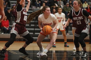Photos: Minooka vs. Moline Girls Regional Basketball