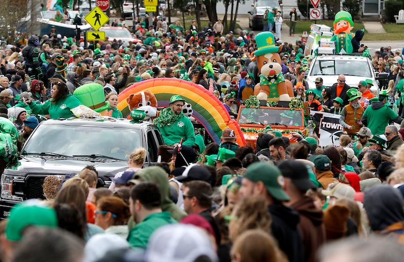 Floats travel through the crowd along Green Street in McHenry during the McHenry ShamROCKS the Fox Festival Parade on Saturday, March 16, 2024.