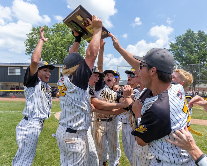 Putnam County Baseball players celebrate sectional championship win against Fulton on June 6, 2026 at Putnam County High School in Granville.
