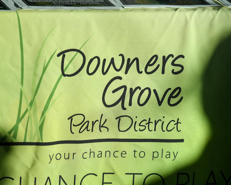 Downers Grove Park District table cover sits at the entry way of the Downers Grove recreation center with information that the recreation center on Saturday Jan. 11, 2025, during the FitFest event.