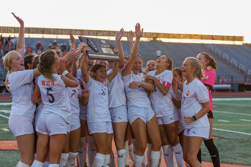 Wheaton Warrenville South celebrates the win over St. Charles East at the Class 3A St. Charles East Sectional Final on Friday, May 29,2026 in St. Charles.