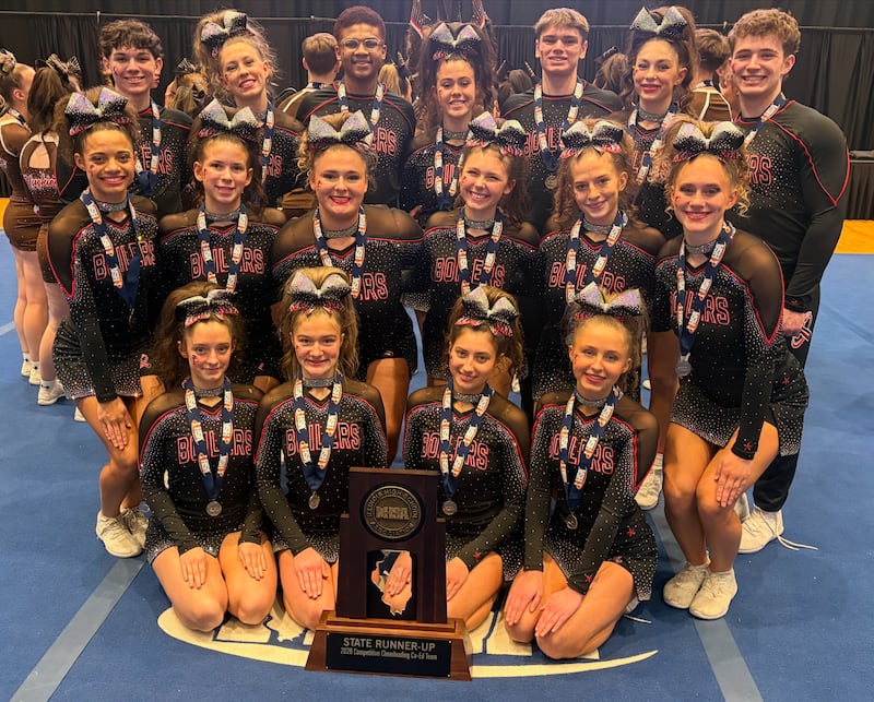 The Bradley-Bourbonnais cheerleading team poses with their trophy after tying for second place in the co-ed division of the IHSA State Finals on Feb. 7, 2026.