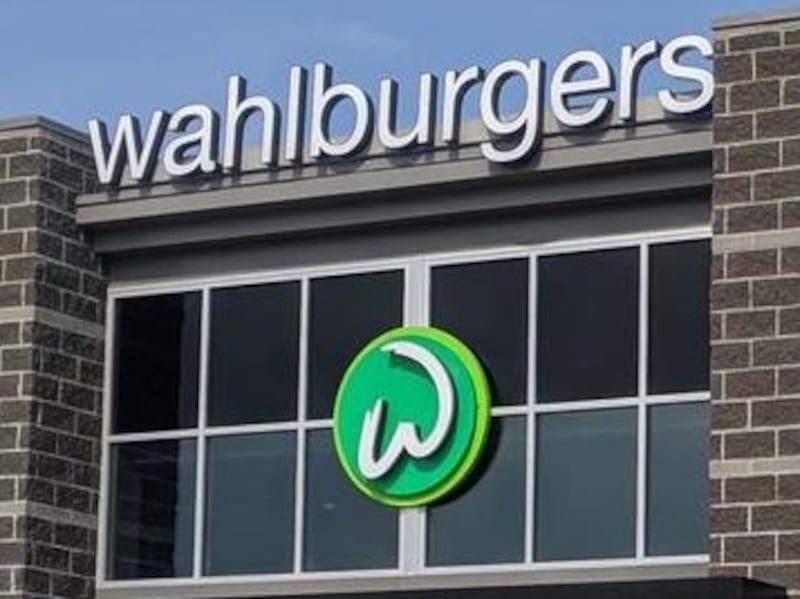 The opening of the new Wahlburgers restaurant in St. Charles has been delayed until the end of the month.