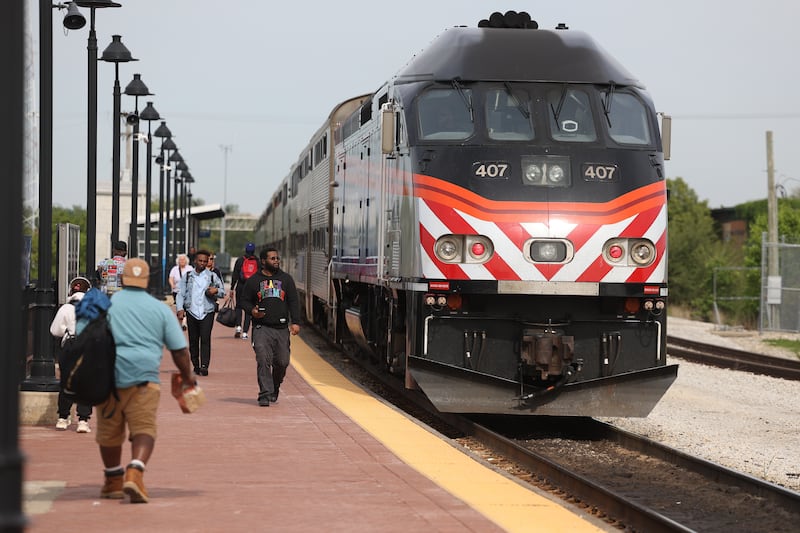 Commuter exit the 405 from Chicago at the Joliet Gateway Center station on Monday, May 15, 2023 in Joliet.