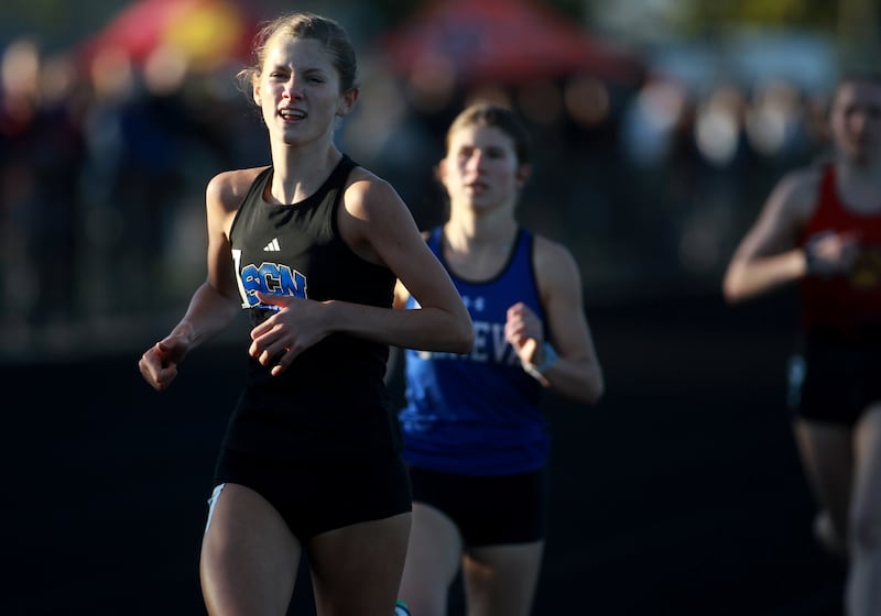 St. Charles North’s Gwen Hobson competes in the 800-meter run during the DuKane Conference Girls Outdoor Championship on Thursday, May 8, 2025 at Glenbard North in Carol Stream.