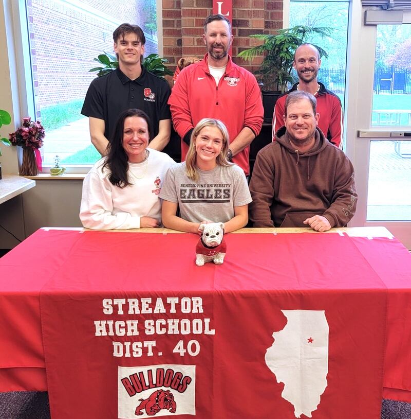 Recent Streator graduate Joey Puetz has signed on to continue her education at Benedictine University in Lisle and her soccer career at the NCAA Division III level with the Eagles. She is pictured here seated between her parents, Jami and Justin Puetz, with coaches Ethan Koncor, J.T. Huey and Joe Sliker standing behind.
