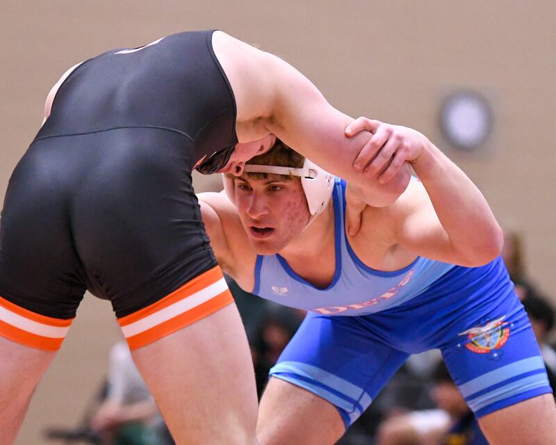Marmion Vincenzo Testa, right, wrestles against Brady Sprangers of Kaukana Wisconsin in the 190-weight class on Tuesday Dec. 30, 2025, during the Flavin Invite held at DeKalb High School.