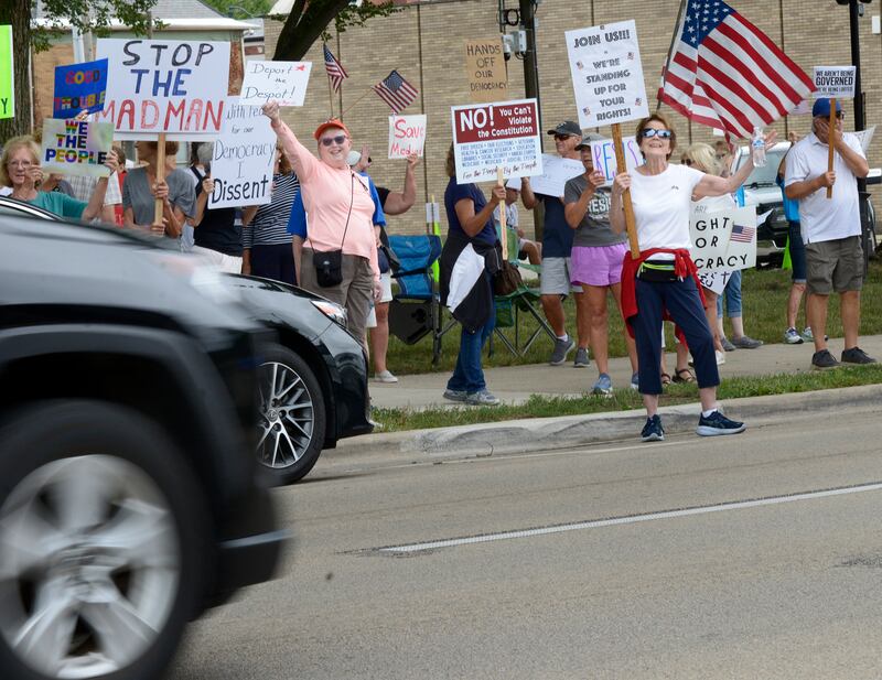 An estimated 100 protesters rallied Saturday along Washington Square in Ottawa promoting and voicing hope and protecting democratic institutions. Illinois Valley Indivisible hosted the “Defend Our Democracy” rally.