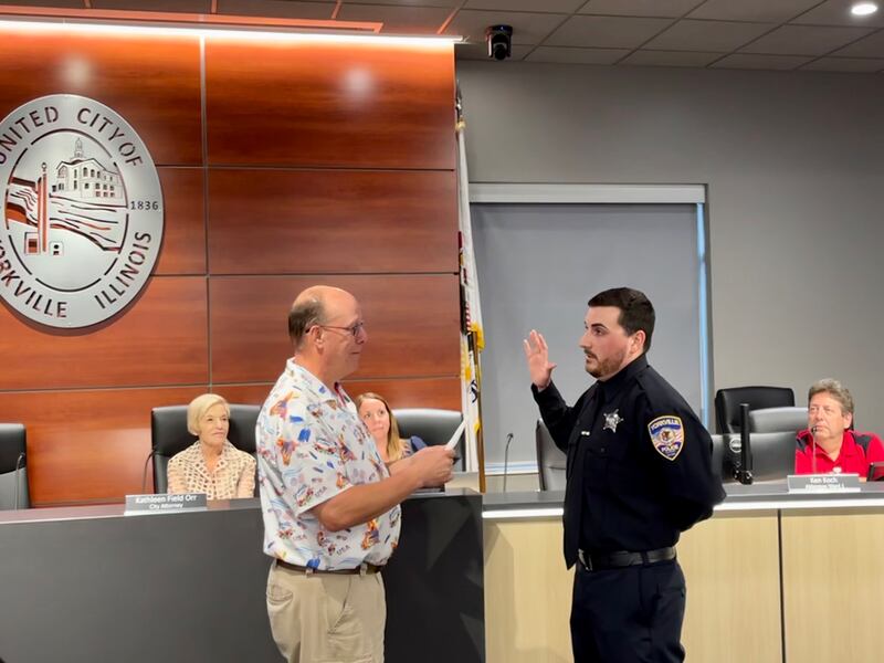 Bret Johnson took the oath of office for the Yorkville Police Department administered by Yorkville Mayor John Purcell.