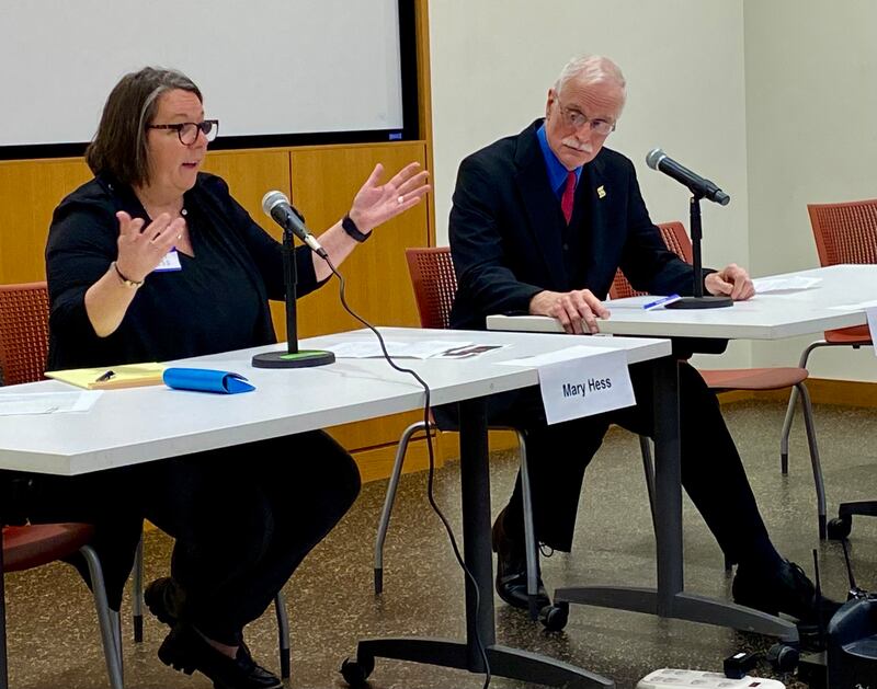 DeKalb Township Supervisor Mary Hess (left) and challenger Jim Luebke, a former DeKalb Township Trustee and current DeKalb County Board member, make their pitches to prospective voters during a candidates forum on March 9, 2025, at the DeKalb Public Library, 309 Oak St.