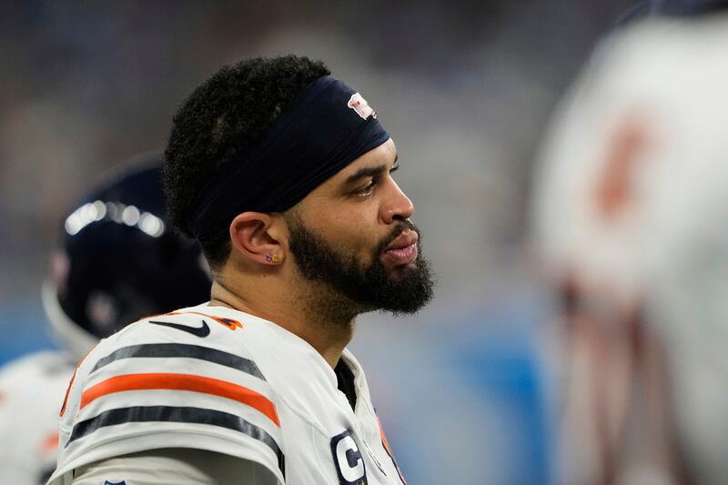 Chicago Bears quarterback Caleb Williams (18) sits on the bench during the second half of an NFL football game against the Detroit Lions in Detroit, Sunday, Sept. 14, 2025. (AP Photo/Ryan Sun)