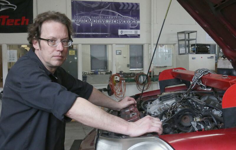 Area Career Center auto instructor Mike Fisher, poses for a photo on Wednesday, April 26, 2025 at La Salle-Peru Township High School.