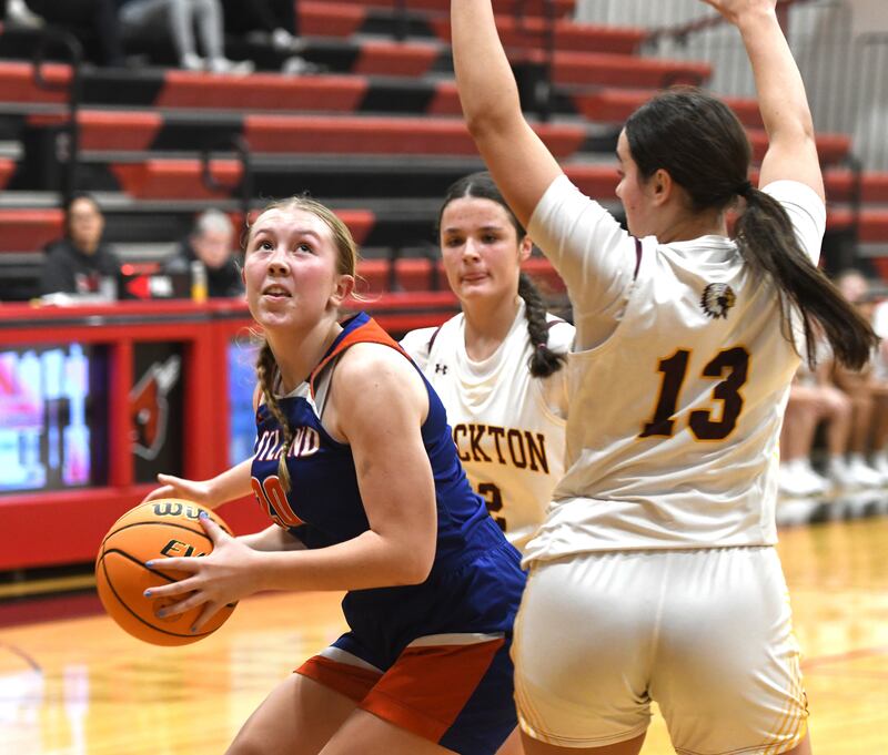 Eastland's Tatum Grim (20) makes a move to the basket during a game with Stockton at the Forreston High School Girls Basketball Thanksgiving Tournament on Friday, Nov. 21, 2025.